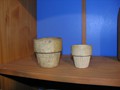 Early stoneware pieces were individually handmade. Later, ribbed ware such as these small flower pots was produced using molds. Collection of the Johnstown Area Heritage Association, Johnstown, PA.  Visit them at www.jaha.org.